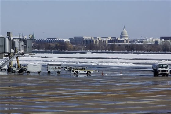 No airplanes are seen on the tarmac at Washington's Reagan National Airport, on Feb. 11, as massive storms have clobbered the area with snow bringing area airports to a halt.